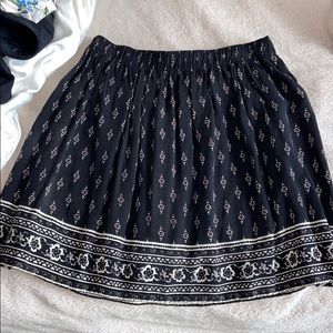 black pattterned skirt